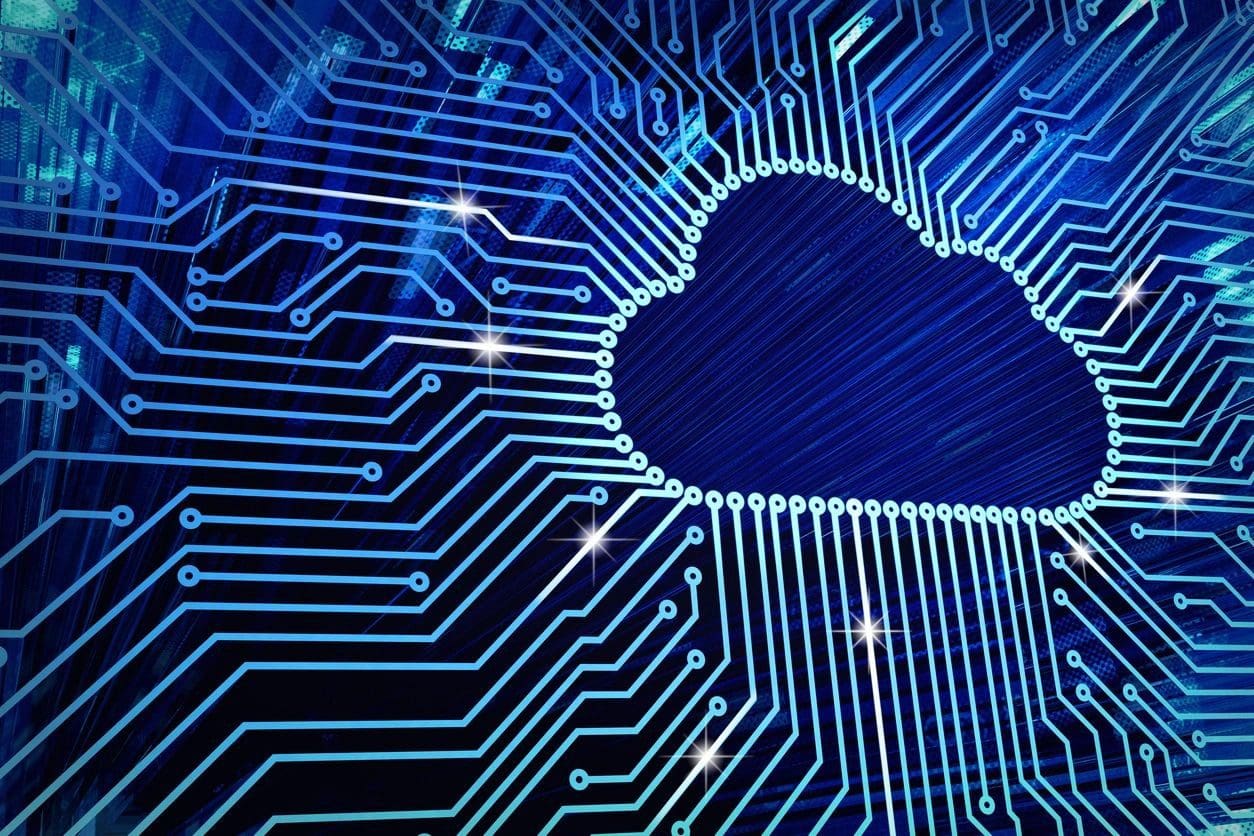 A computer circuit board with the cloud in the center.